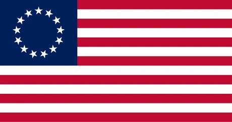 The Betsy Ross flag: thirteen stars arranged in a circle over thirteen red-and-white stripes